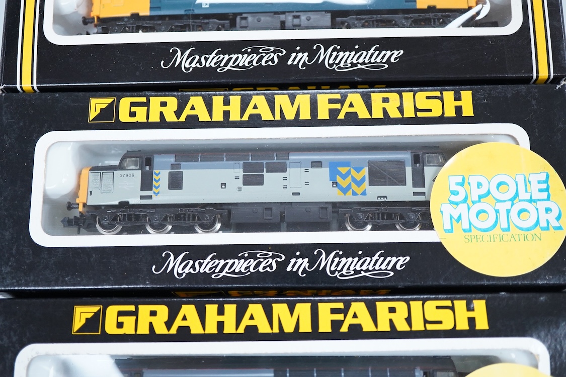 Four boxed Graham Farish N gauge railway Class 37 diesel locomotives; a BR, 37 408 (8035), a BR Coal Sector, 37696 (8036), a BR Petroleum Sector, 37 887 (8037) and a BR Railfreight Metals, 37 906 (8038).